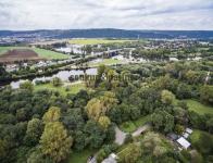 Stavební pozemek 6.000 m2, Praha 12 - Komořany.