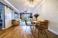 Luxusní byt 3+kk (114 m2) s terasou 30 m2, zahradou a parkovacím stáním